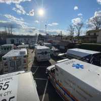 <p>A procession of Monmouth County EMS, firefighters and police outside Robert Weber&#x27;s home in Middletown.</p>