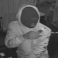 <p>A masked man is wanted after robbing an Eastport cellphone store.</p>