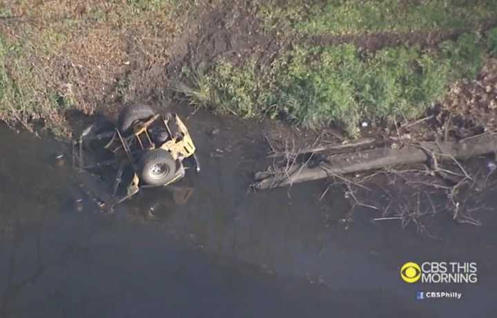 CBS 3 Philadelphia&#x27;s Chopper 3 caught this image of a submerged vehicle in Cinnaminson on Tuesday.