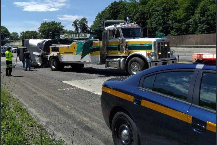 Dump Truck Strikes Overpass On I-684