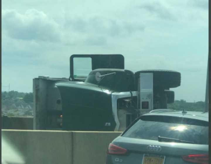 Overturned tractor trailer shuts Route 440 Eastbound at the Outerbridge Crossing going into New Jersey.