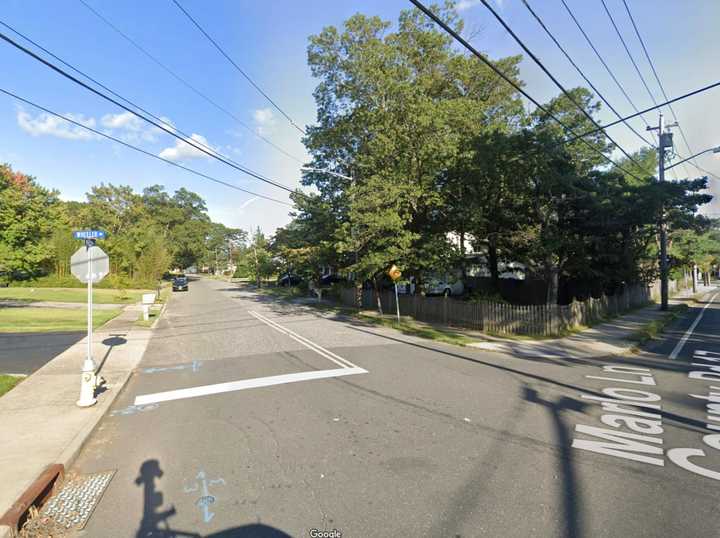 The intersection of Wheeler Road and Mario Lane in Happaugue