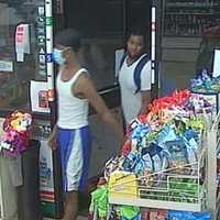 <p>Two men are wanted after threatening a 7-Eleven store clerk with a weapon in Carle Place.</p>