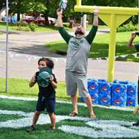 <p>Cindy&#x27;s family celebrates after having their yard transformed by Pepsi.</p>