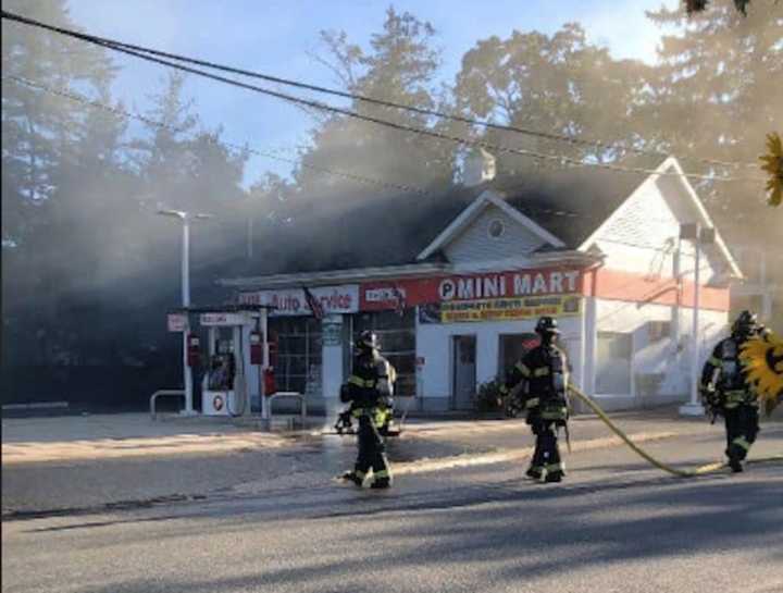 Firefighters on the scene of the 311 Glen Cove Ave fire.