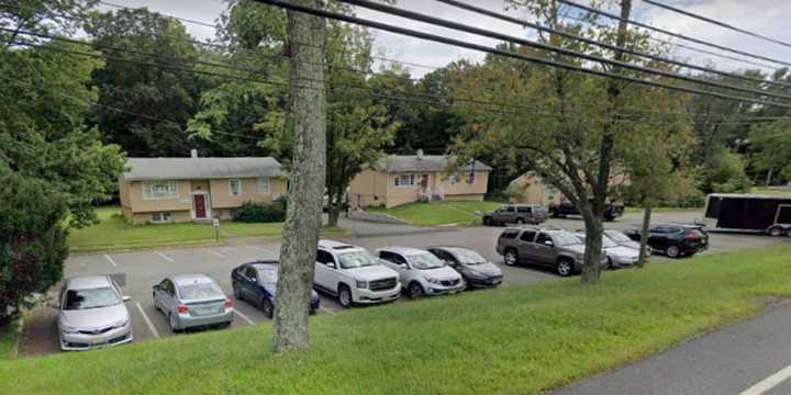 Police responding to this Route 206 parking lot on reports of a woman sleeping in a BMW located a Florida driver later found with heroin, they said.