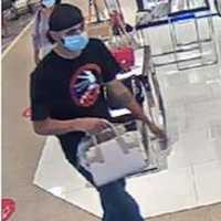 <p>Surveillance photo of the wanted man</p>