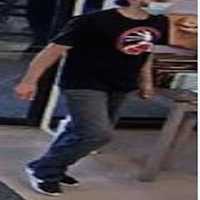 <p>Surveillance photo of the wanted man</p>