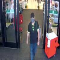 <p>Security footage of the wanted man.</p>