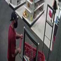 <p>Security footage of the wanted man.</p>