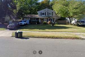 Dump Truck Crashes Into House On Long Island, Landing In Kitchen