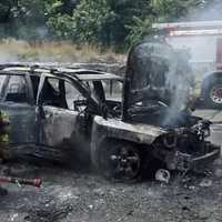 <p>The aftermath of the burning car wreck that 18-year-old Justin Gavin braved to save a woman he had never met and her three children.</p>