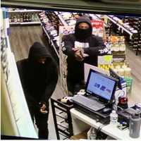 <p>Know them? Police are asking for help identifying two men who allegedly robbed a liquor store.</p>