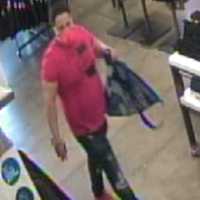 <p>A still, captured from surveillance footage at Old Navy, of the wanted man.</p>