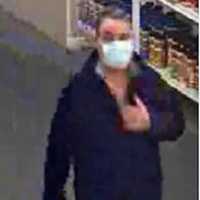 <p>A surveillance image of the wanted man</p>