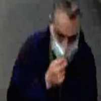 <p>A surveillance image of the wanted man</p>