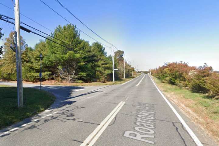 Man, Woman Charged After Victim Found Dead Inside Vehicle On Long Island