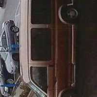 <p>The older-model Chevrolet van, driven by a third woman, that the thieves used to flee the scene.</p>