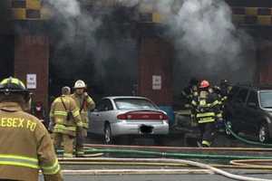 PHOTOS: Middlesex Volunteer Firefighter Hurt Battling Auto Shop Blaze