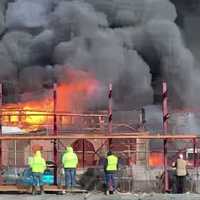 Firefighters Battling Large Blaze At Warehouse In Area