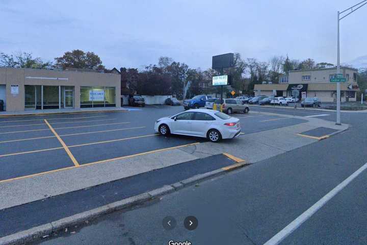 Pickup Truck Slams Into Long Island Radio Shack Building