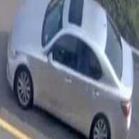 <p>Surveillance footage of the sedan that the woman used to flee the scene.</p>