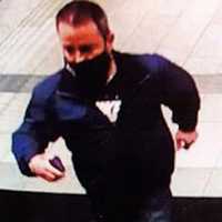 <p>A surveillance image of the wanted man</p>