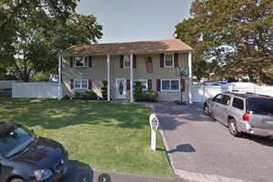 Three-Vehicle Crash Ends With Car Landing Inside Long Island House, Three Injuries