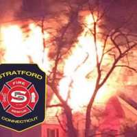 <p>A woman and a child were hospitalized for possible smoke inhalation following a Stratford house fire.</p>