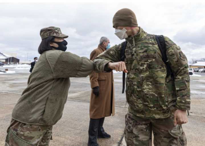 U.S. Army Col. Lisa J. Hou, state Adjutant General and Commissioner of the New Jersey Department of Military and Veterans Affairs, greets Airmen during the return of 108th Wing and 177th Fighter Wing members to New Jersey on Wednesday.