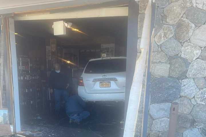 Car Plows Into Store In Area