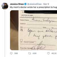 <p>A doctor wrote a grandmother a prescription to hug her granddaughter after getting her second vaccine</p>