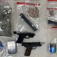 <p>The drugs and guns seized.</p>