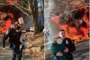 Officers Race In To Help Rescue Two Children After House Fire Breaks Out In Area