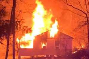 PHOTOS: Fire Crews Douse Late-Night Sussex County Camp Building Blaze With 62K Gallons Of Water