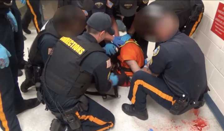 Atlantic County correctional officers restraining Mario Terruso, Sept. 15, 2019.