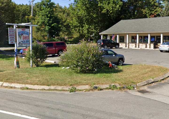 An Orange County man and woman were arrested for allegedly robbing a deli at gunpoint.