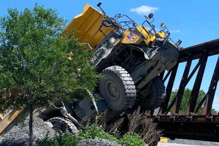 PHOTOS: Driver Trapped; Dump Truck, Train Engine Severely Damaged In Head-On Crash In Nazareth