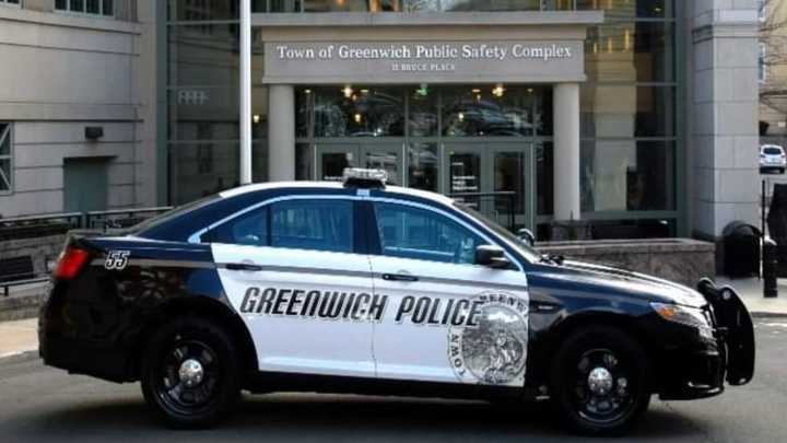 A Connecticut woman was charged with threatening and harassment after allegedly writing messages on the doors and windows of a Greenwich business and sending text messages.&nbsp;