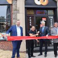 <p>White Plains Mayor Thomas Roach, Westchester County Executive George Latimer, and Bagels &amp; Deli Express owner Anthony Barona at the grand opening of the new shop.</p>