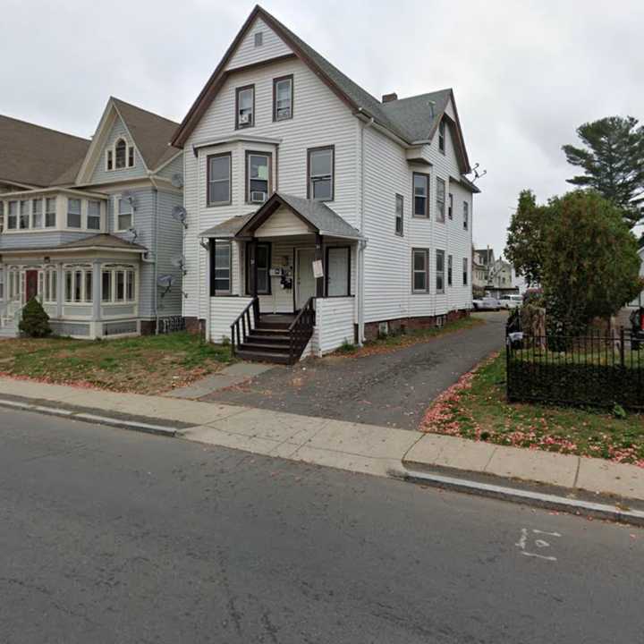 The scene of the drive-by shooting that killed a woman cooking in her kitchen.