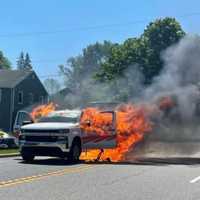 <p>A Chevrolet pickup truck caught fire in Sussex County Wednesday morning and caused a temporarily road closure and delays in the area, authorities said.</p>