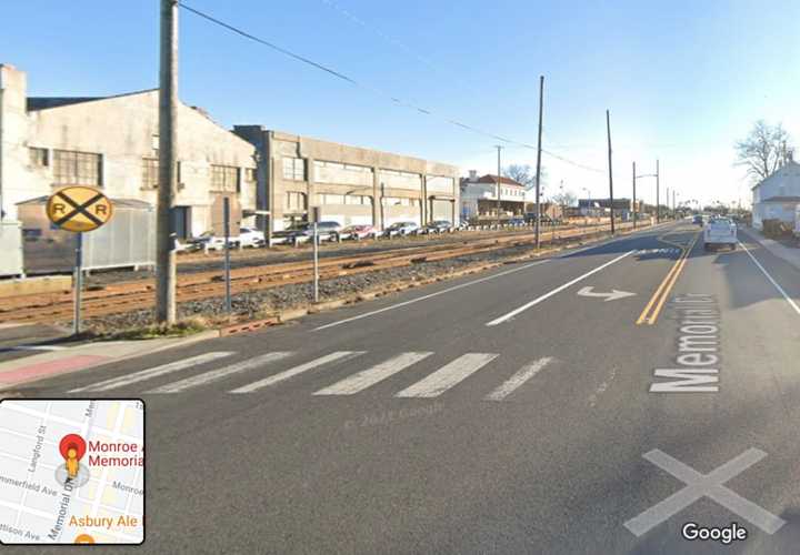 A NJ Transit line crossing at 600 Memorial Drive and Monroe Avenue in Asbury Park.