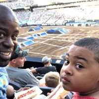 <p>Jersey City police officer Morton Otundo and his son, Andrew.</p>