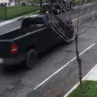 <p>Police in West Springfield released photos of a suspect and his vehicle after allegedly stealing a Bobcat.</p>