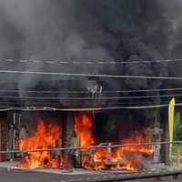 <p>One person was hospitalized after a vehicle went up in flames that extended to a gas station on Route 206 Monday morning, authorities said.</p>