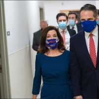 <p>Gov. Kathy Hochul with her predecessor, Andrew Cuomo</p>