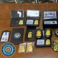 <p>A few of the badges that were found during the raid, including some with the deputy mayor&#x27;s name on them.</p>