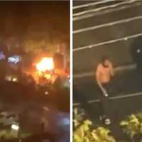 <p>Photos from the scene show Chancelle Ibin Young pacing on Franklin Street with a firearm before setting a car on fire, authorities said.</p>