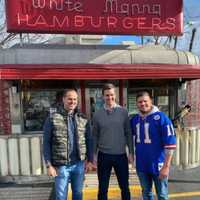 <p>Former NY Giants Shaun O&#x27;Hara, Eli Manning and comedian Chris Distefano outside of White Manna in Hackensack.</p>